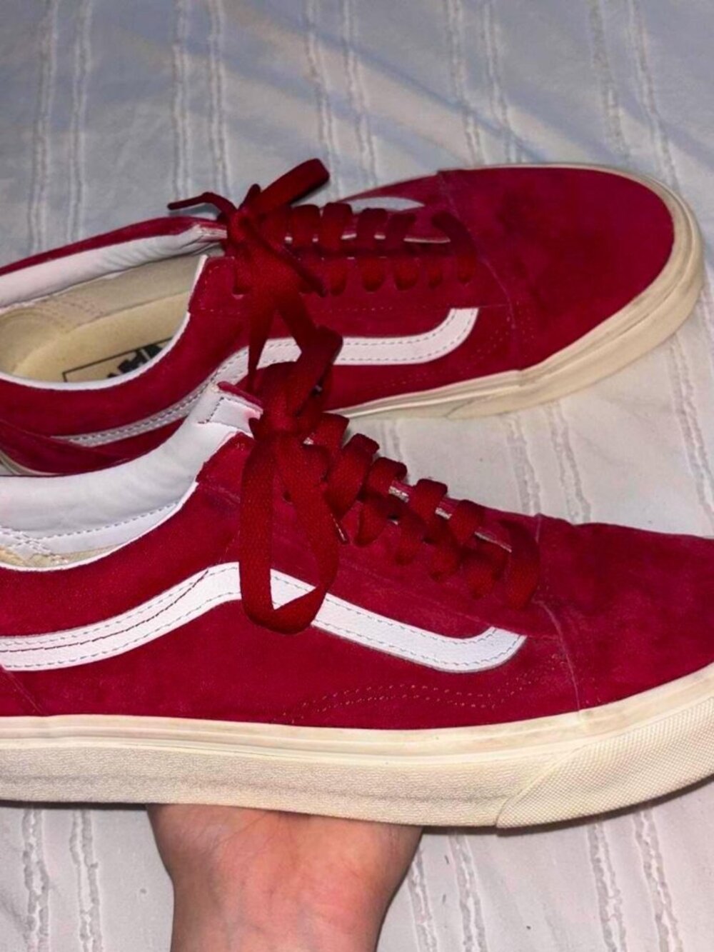 Vans burgundy suede skateboarding shoes.